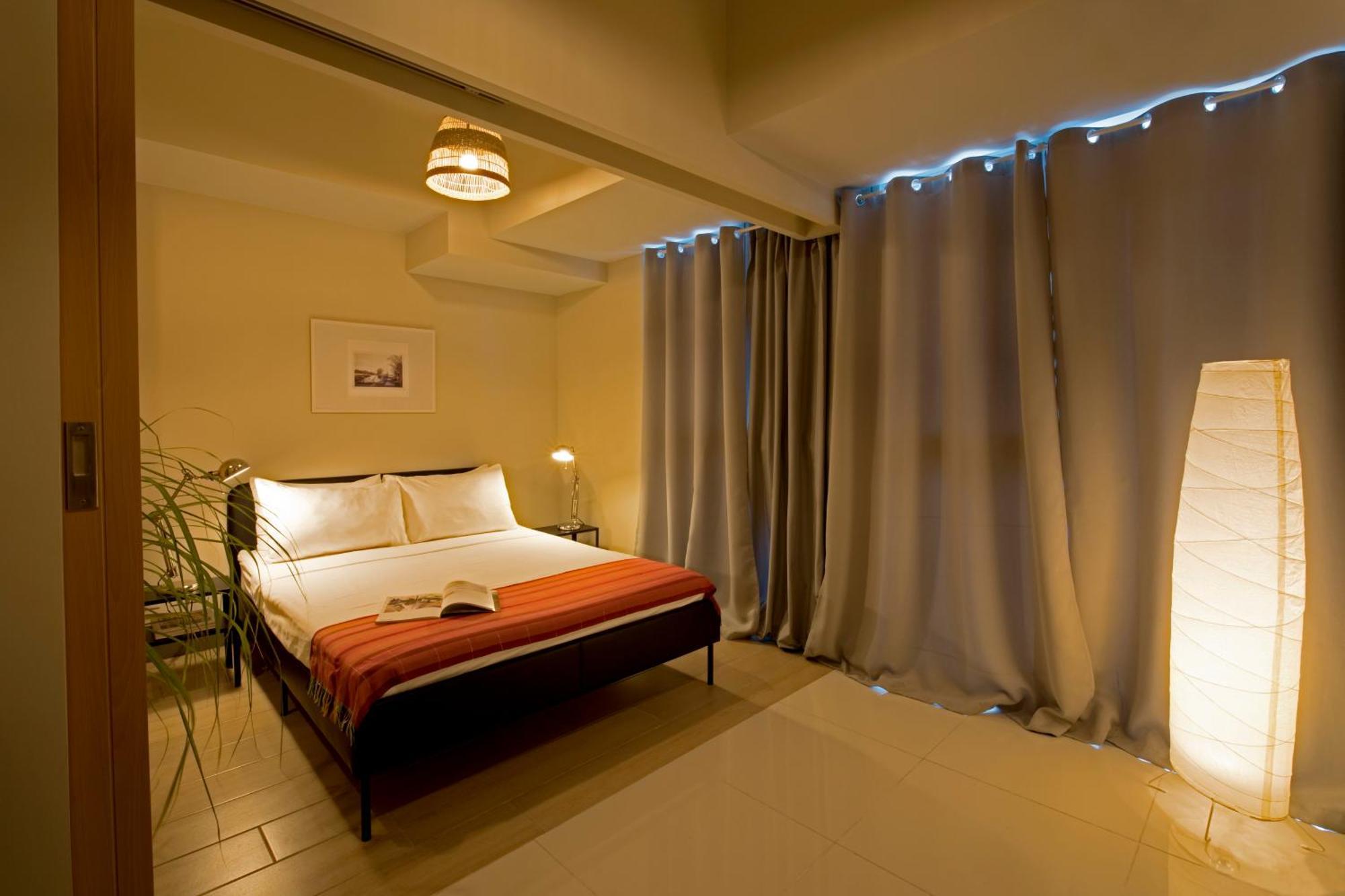 Uptown Parksuites Apartments Tower 2 Bgc By Ph Staycation Manila Exterior photo